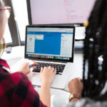 Women-of-color-in-tech-on-computer