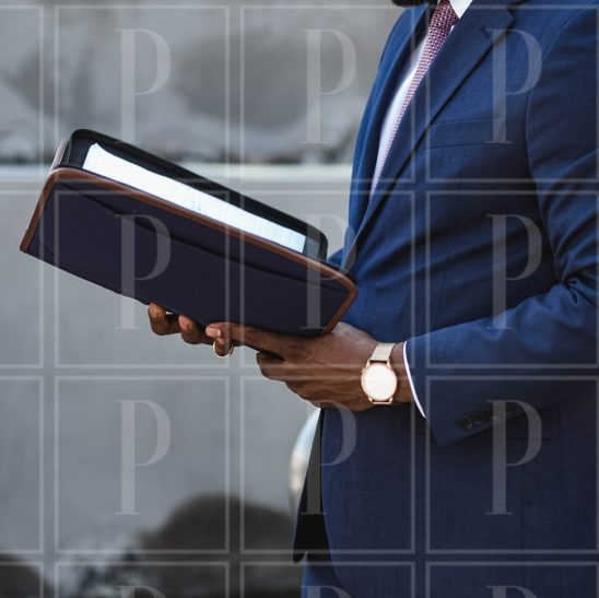 Black-Man-Holding-Notebook