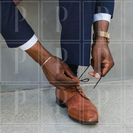 Businessman-Tying-Shoe