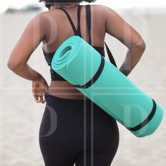 Woman Holding Yoga Mat